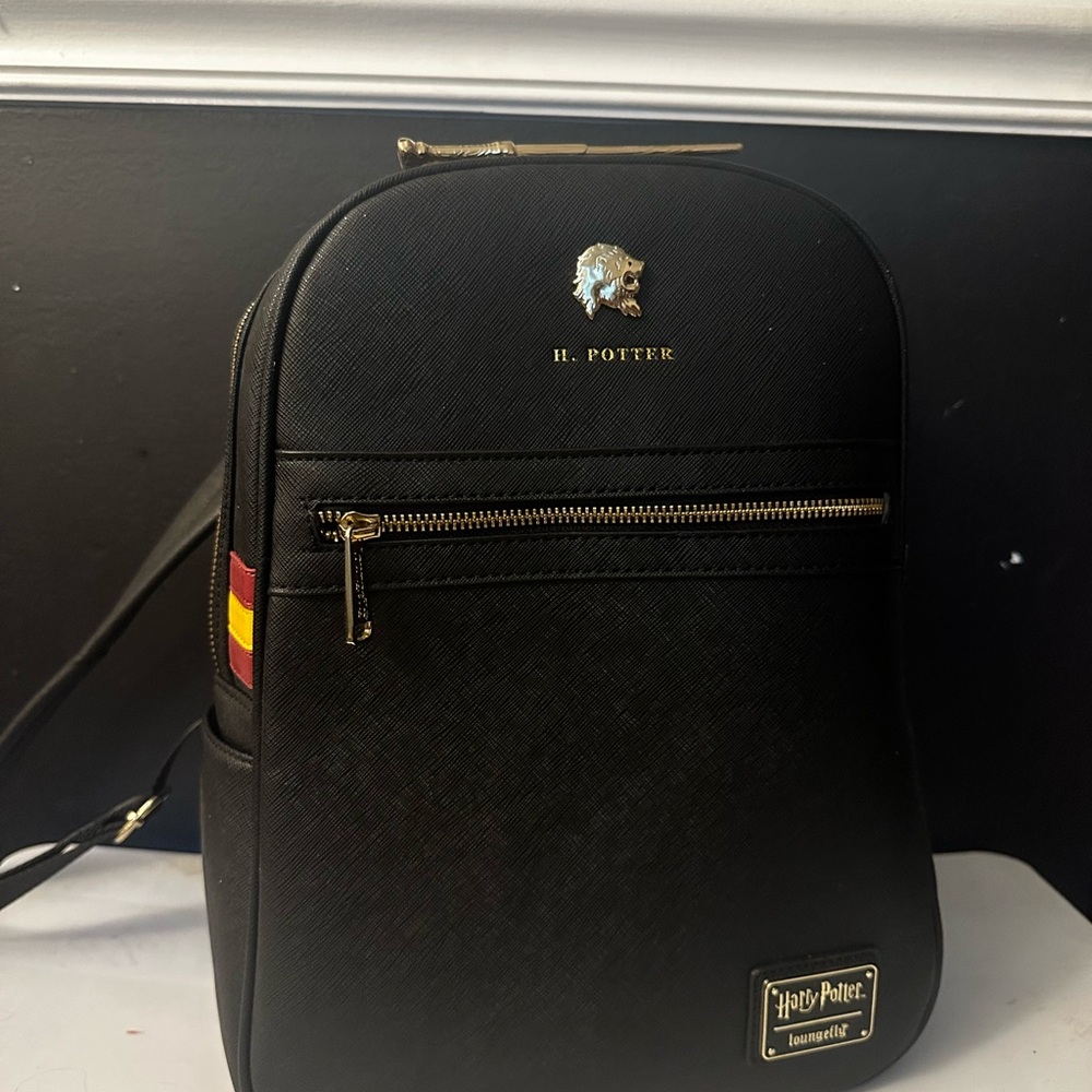 Loungefly Black and Gold Harry Potter Backpack